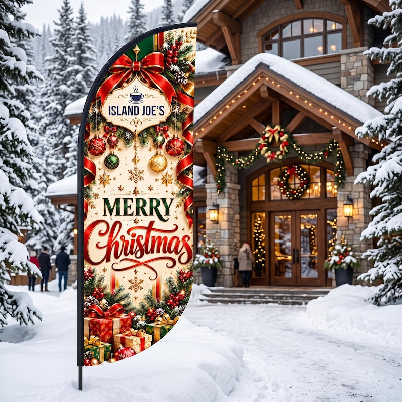 May include: A vertical feather flag featuring a cream background with red ribbons, green pine branches, gold stars, and colourful ornaments. The text reads Island Joe's and Merry Christmas in red and green script and block lettering.