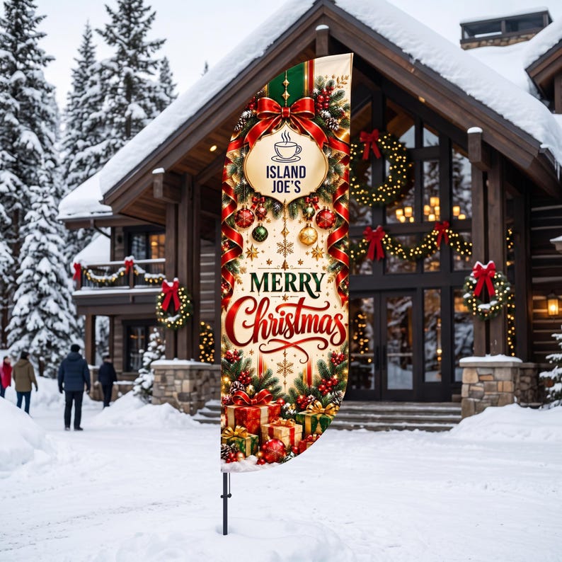 May include: A vertical feather flag featuring a Christmas theme with red ribbons, pine branches, ornaments, and wrapped gifts. The text reads ISLAND JOE'S above a coffee cup icon and the words MERRY Christmas in red and green script.